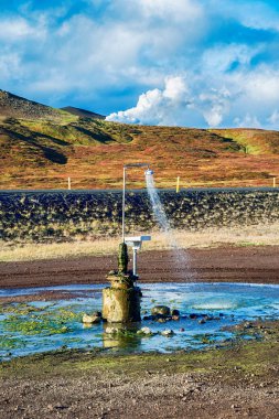 Outdoor shower works all year with geothermal water in Iceland clipart