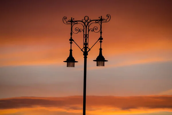 Street light at sunset — Stock Photo, Image