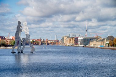 BERLIN - OCTOBER 22, 2017: Molecul Man sculpture  in Berlin, Ger clipart