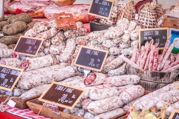 Stand with sausages on the market in Gordes, Provence, France