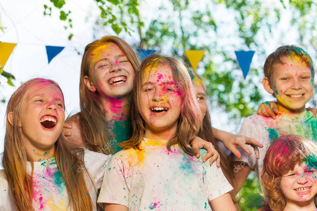 Kids having fun with colored powder