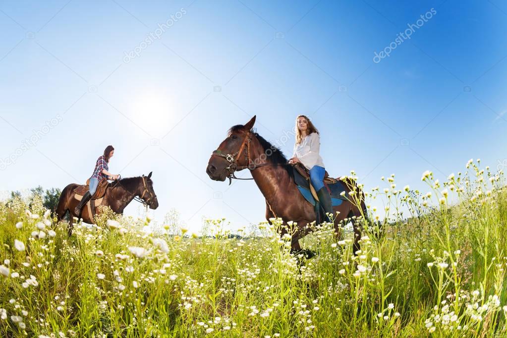 Two female equestrians