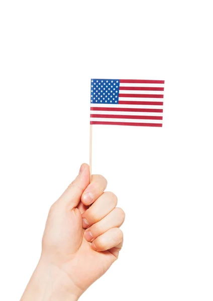 Hand hält Fahne der USA — Stockfoto