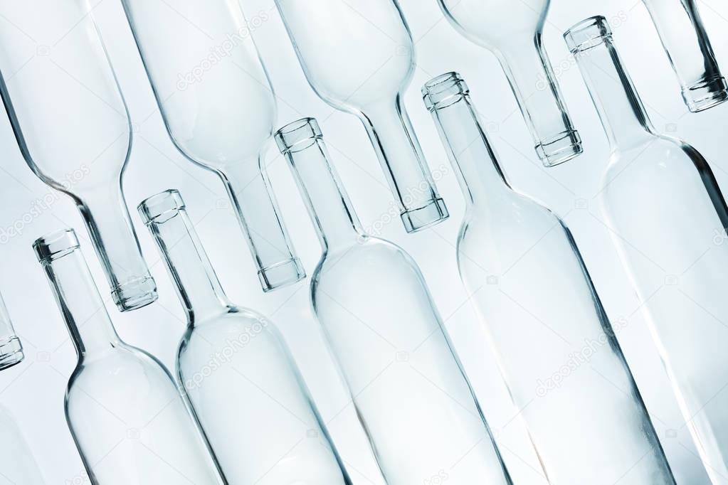 Crystal glass empty bottles laying