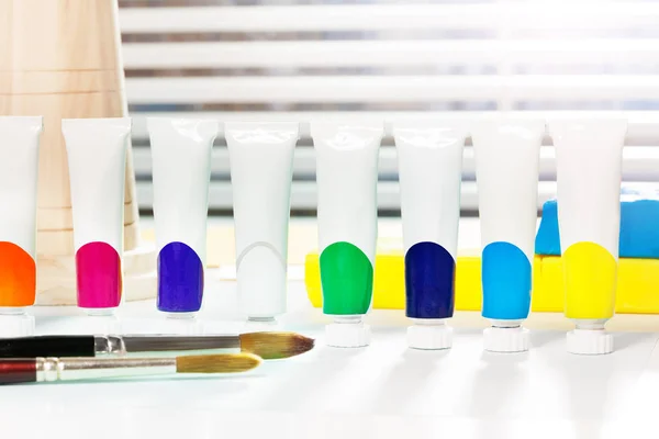 Tubes of multicolored paints — Stock Photo, Image