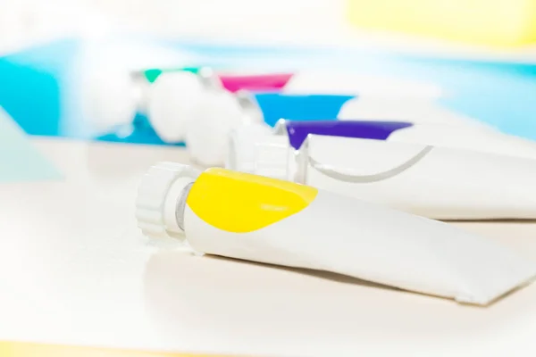 Tubes of multicolored paints — Stock Photo, Image