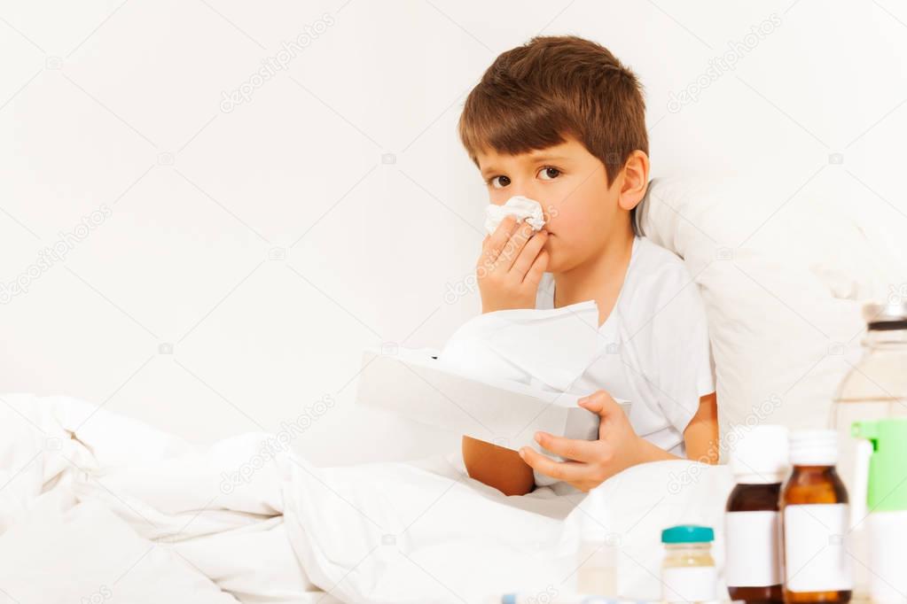 Boy using paper napkins
