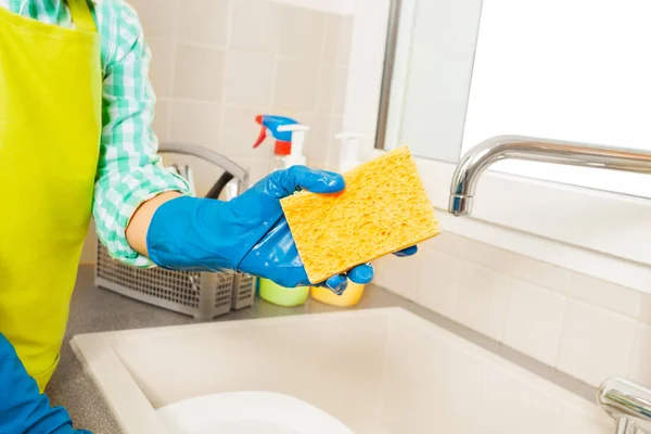 Boy wash dishes with sponge — Stock Photo, Image