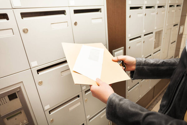 woman hands holding envelopes