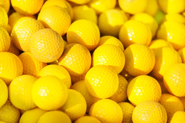 Pile of yellow golf balls — Stock Photo, Image
