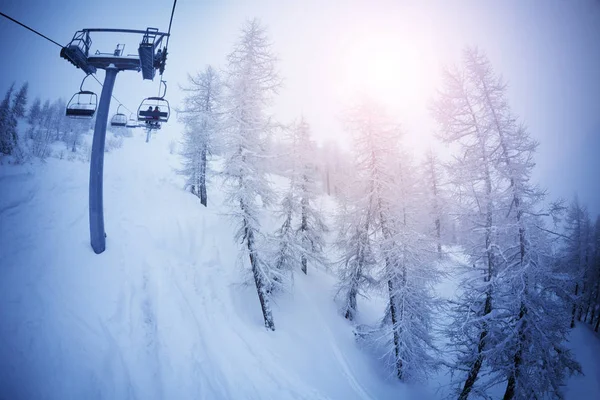 Empty cabins of chairlift — Stock Photo, Image