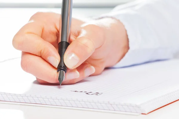 Hände machen Notizen — Stockfoto