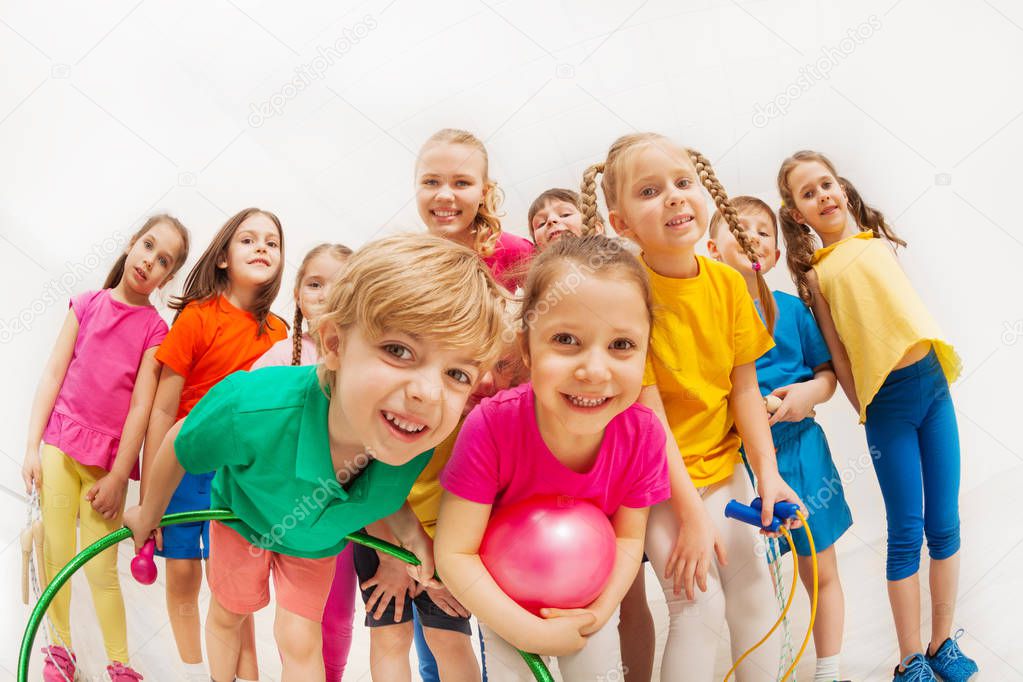 Portrait of happy kids at gym