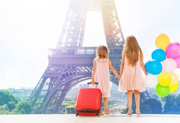 Back View Two Little Girls Suitcase Balloons Holding Hands While — Stock Photo, Image