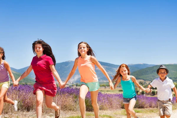 Portrait Exited Children Age Diverse Boys Girls Running Holding Hands — Stock Photo, Image