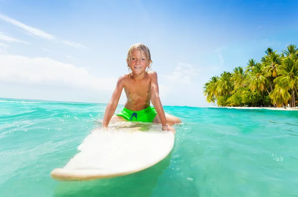 Blond Little Boy Surfing Board Swimming Sea Palms Background — Stock Photo, Image