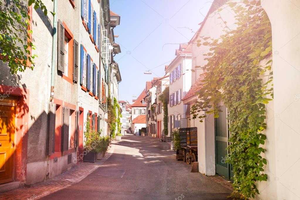 Old tranquil street of Basel with ancient houses at sunny day, Switzerland