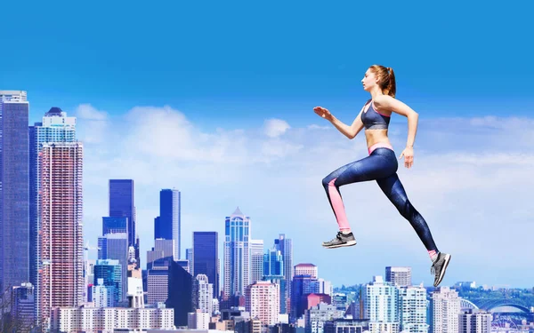 Female Athlete Running Upstairs Skyscrapers Rooftops Blue Sky Copy Space — Stock Photo, Image