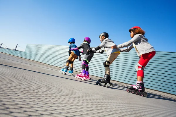 Happy Preteen Kids Having Fun While Rollerblading One Another Track — Stock Photo, Image