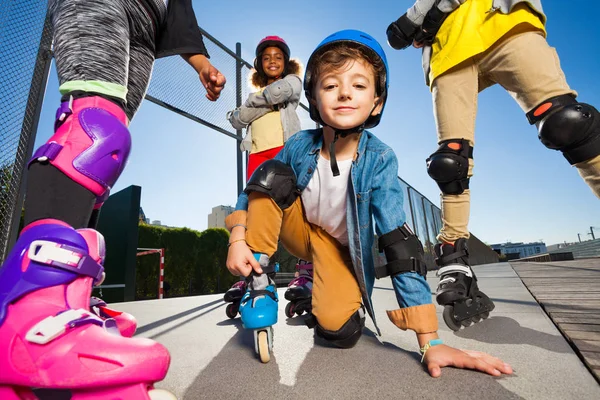 Cute Schoolboy Safety Gear Roller Skates Outdoors — Stock Photo, Image