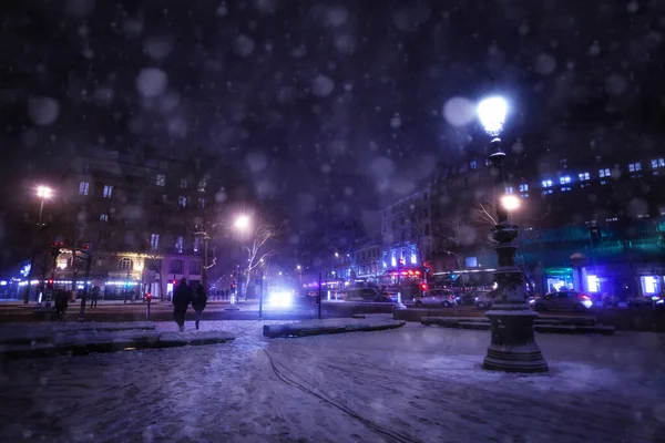 Snowfall on Republique square in Paris at night — Stock Photo, Image