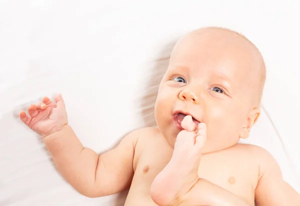 Little infant baby and the foot view from above — Stock Photo, Image