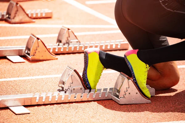 Shoes and start track before sprint run on stadium — Stock Photo, Image