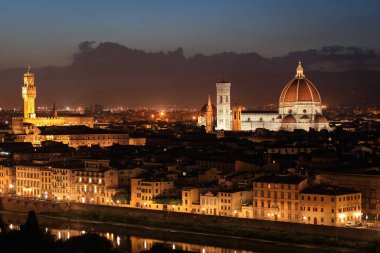 Night in Florence, Italy, from Piazzale Michelangelo. Panoramic view to the city and the river Arno with Ponte Vecchio and Cathedral of Santa Maria del Fiore.