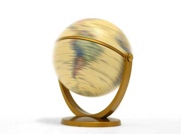 Globe spinning over white — Stock Photo, Image