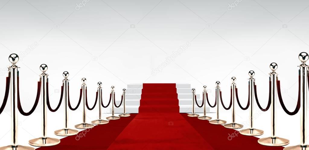 Red carpet with stairs at the end over white