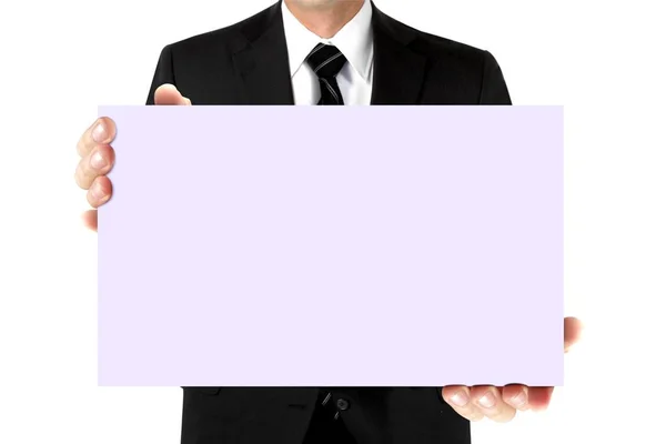 Hombre de traje sosteniendo tablero de tarjetas en blanco — Foto de Stock