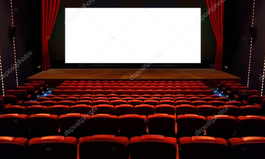 Theater hall with red seat and wide blank white screen