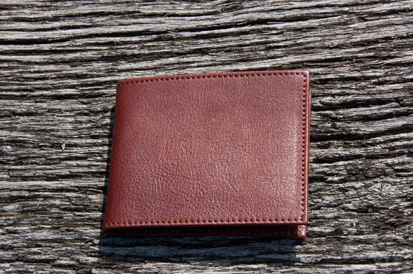 Leather wallets on a wooden table — Stock Photo, Image