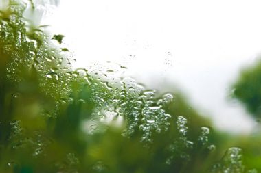 cam yüzey su ile arka plan Yağmur damlaları