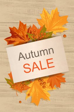 Sarı yapraklar ve ahşap arka plan üzerinde Satılık çerçeve yazı ile sonbahar arka plan.