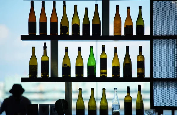 Many Bottles Shelf Window — Stock Photo, Image