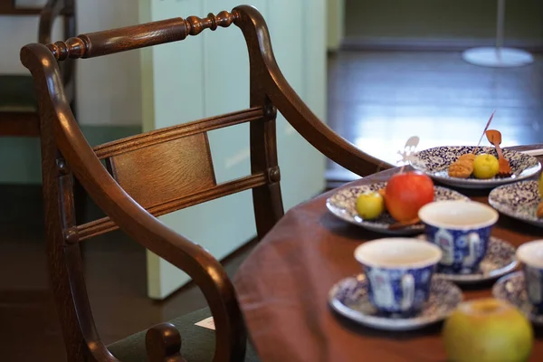 Tableware with the food and drink of the table of the room