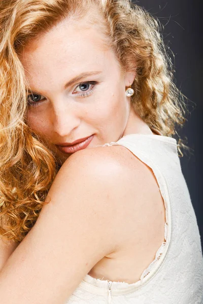 Portrait of beautiful lady on grey. Studio shot — Stock Photo, Image