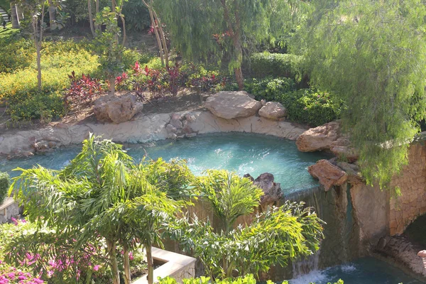 Tropischer Garten Wasserfall Stockfoto