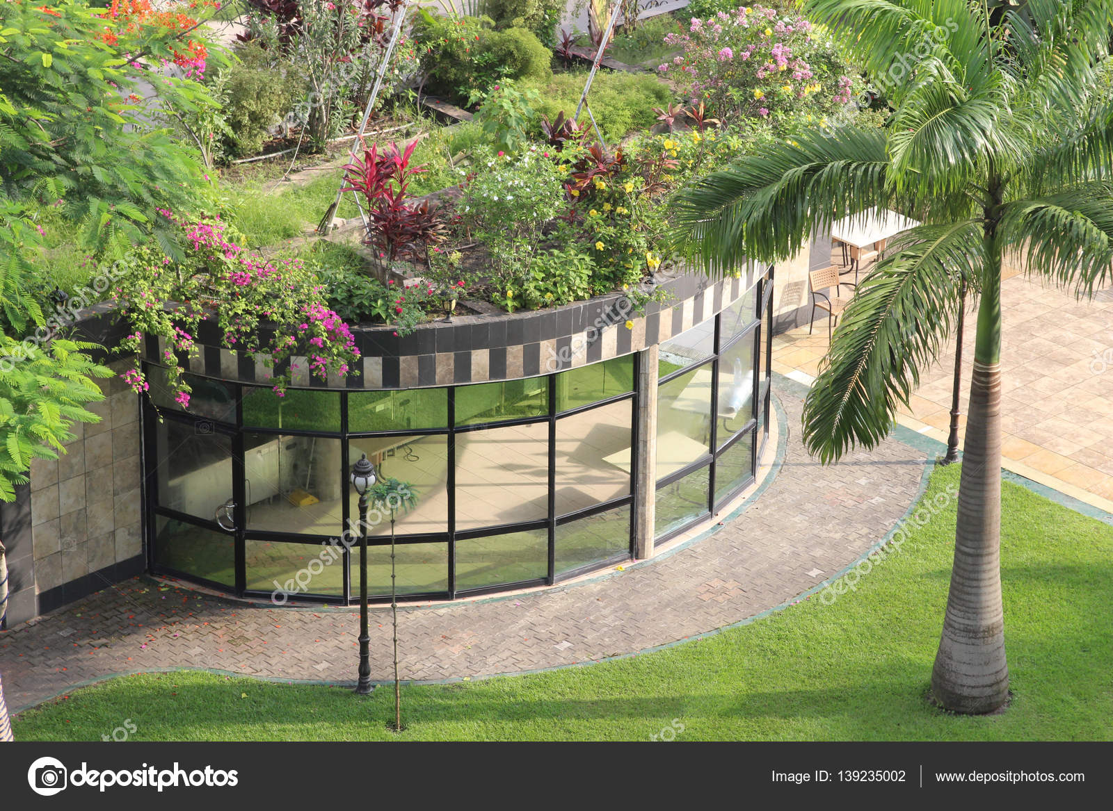 A Tropical Garden In A Hotel Stock Editorial Photo C Theosid A Tropical Garden In A Hotel Stock Editorial Photo C Theosid