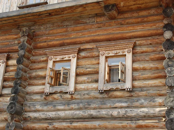 Log house windows