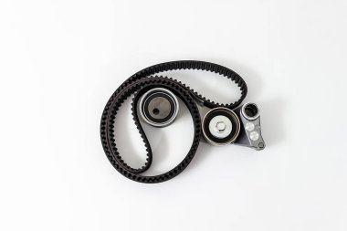 Kit of timing belt with rollers on a white background isolated. Auto Parts. Spare parts. clipart