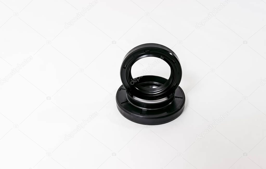  Oil seal on a white background isolated. Auto Parts. Spare parts.