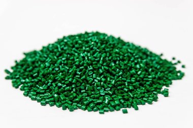 Polymeric dye. Plastic pellets. Pigment in the granules. clipart
