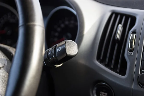 Wiper stalk. Car dashboard.  Auto inside. Windscreen wiper handle. — Stock Photo, Image
