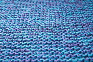 Mavi örgü arka plan. Örme doku. Örgü örneği. 