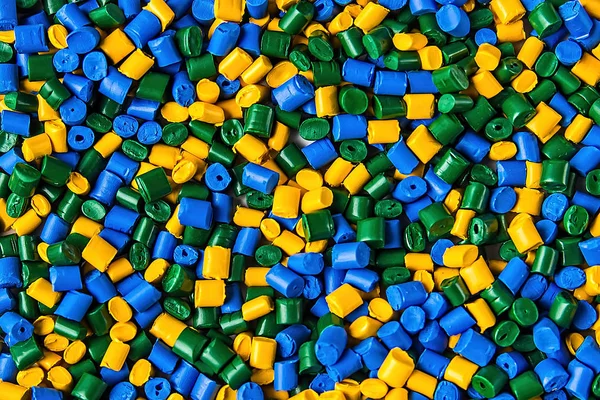 Polymeric dye. Plastic pellets. Colorant for plastics. Pigment i — Stock Photo, Image