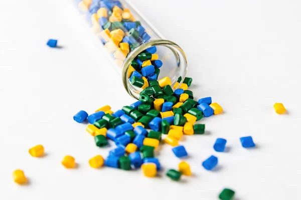 Polymeric dye. Plastic pellets. Colorant for plastics. Pigment i — Stock Photo, Image