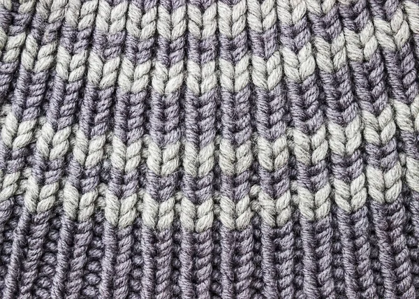 Серый вязаный фон. Вязание текстуры. Образец вязания . — стоковое фото