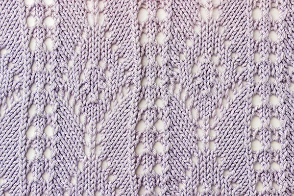 Pletené prolamované pozadí světle modrá. Pletená textura. Knittin — Stock fotografie